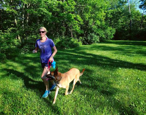 Running in XX2i Optics Bahamas1 Sunglasses with Belgian Malinois